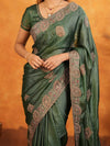 Bottle Green Fendy Satin Embroidered Saree with Intricate Floral Border & Tassels | Designer Saree with Heavy Embroidered Blouse