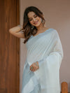 Pure White & Teal Blue Handloom Cotton Saree with Minimal Striped Border & Tassel Detailing