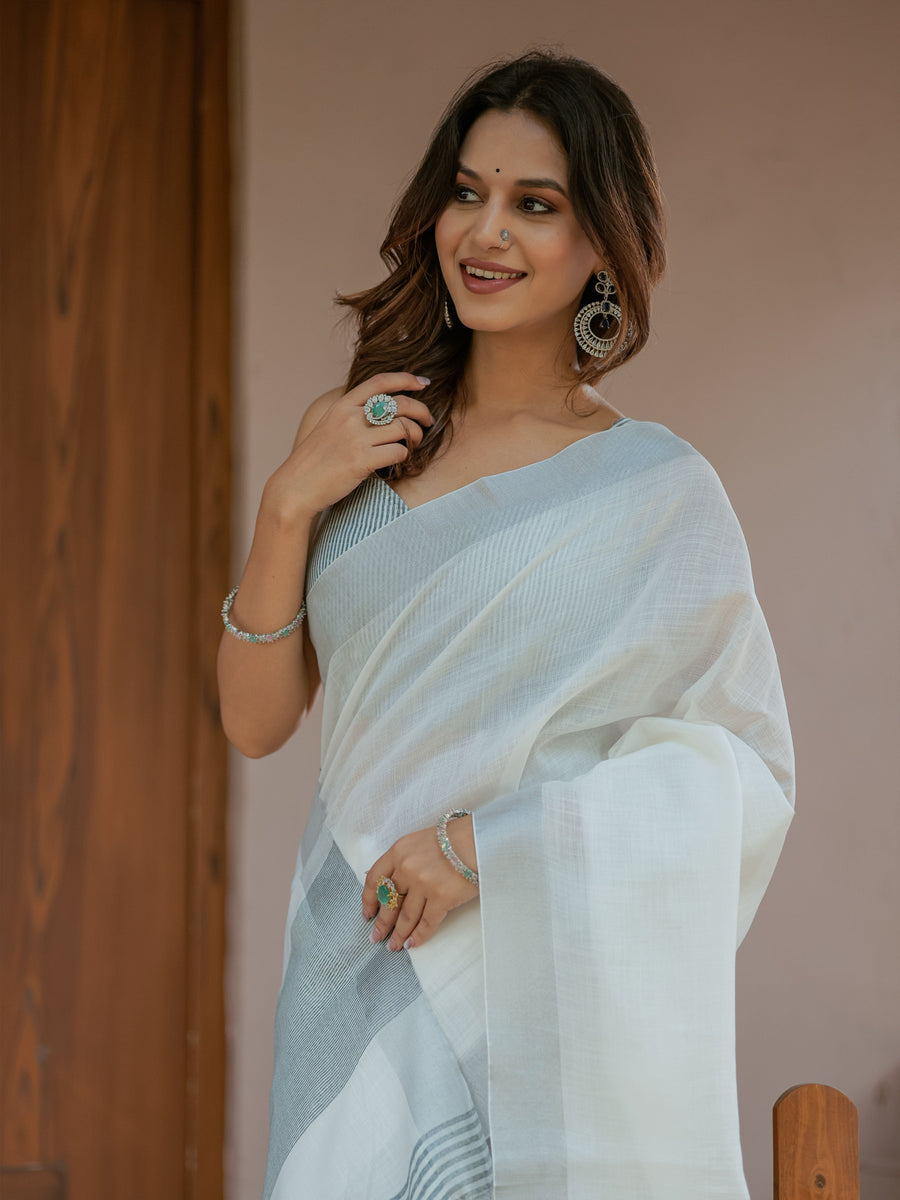 Pure White & Teal Blue Handloom Cotton Saree with Minimal Striped Border & Tassel Detailing