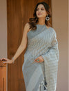 Ash Grey Handloom Cotton Saree with Minimal Striped Weaving & Tassel Detailing