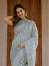 Ash Grey Handloom Cotton Saree with Minimal Striped Weaving & Tassel Detailing