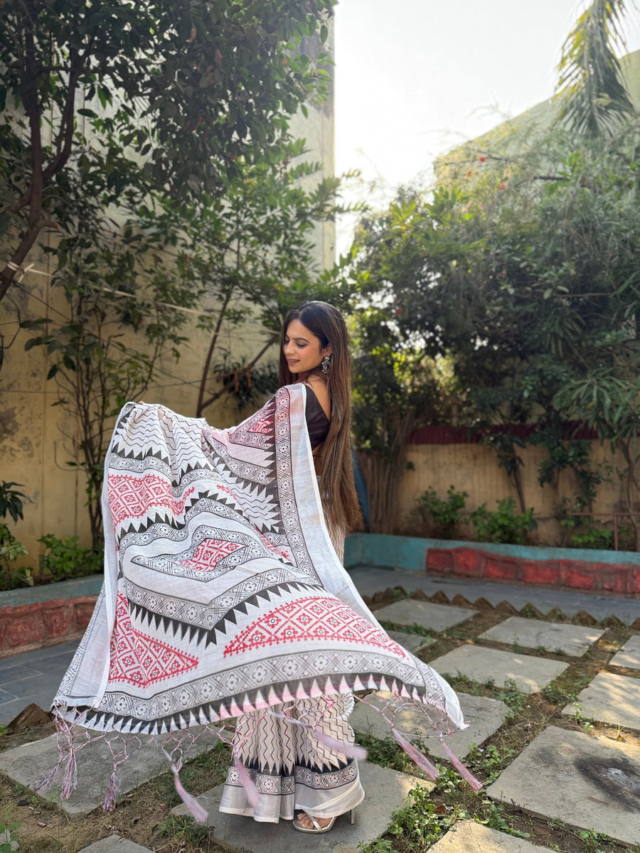 White Pure Linen Digital Printed Saree with Chevron Design and Intricate Red-Black Geometric Pallu – Tassel Details and Matching Blouse Piece