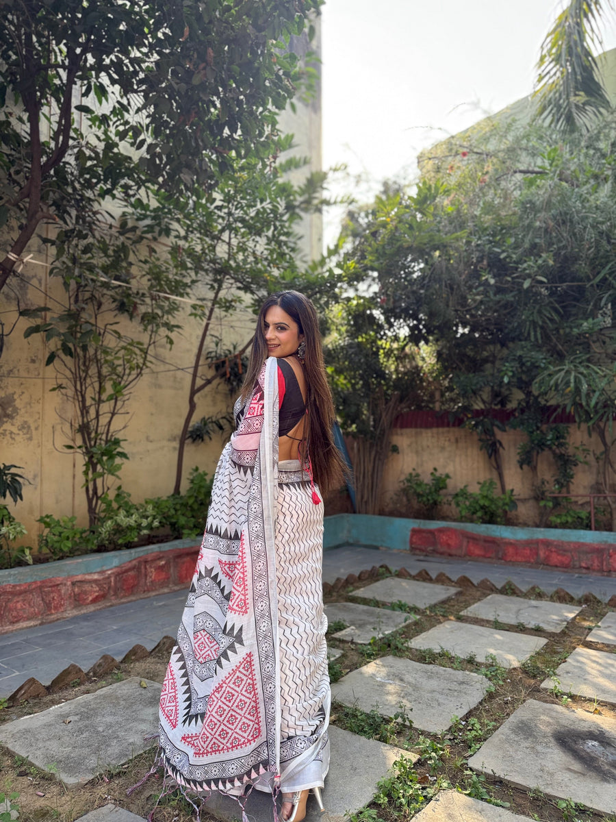 White Pure Linen Digital Printed Saree with Chevron Design and Intricate Red-Black Geometric Pallu – Tassel Details and Matching Blouse Piece