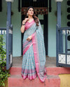 Aqua Blue Pure Cotton Linen Saree | Pink Border, Floral Motifs & Tassel Edges