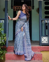 Blue Pure Cotton Linen Saree with Floral Pattern, Blouse, and Tassels on Edges