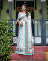 Ivory Cotton Linen Saree | Elephant Motif, Floral Print, Green & Pink Borders – Buy Online