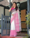 Elegant White and Pink Pure Cotton Linen Saree with Intricate Floral and Geometric Border Design and Tassels on Edges