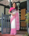 White and Pink Pure Cotton Linen Saree with Intricate Floral and Geometric Border Design and Tassels on Edges