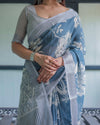Pastel Blue Floral & Geometric Printed Cotton Linen Saree | Blouse & Tassel Edges