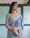 Pastel Blue Floral & Geometric Printed Cotton Linen Saree | Blouse & Tassel Edges