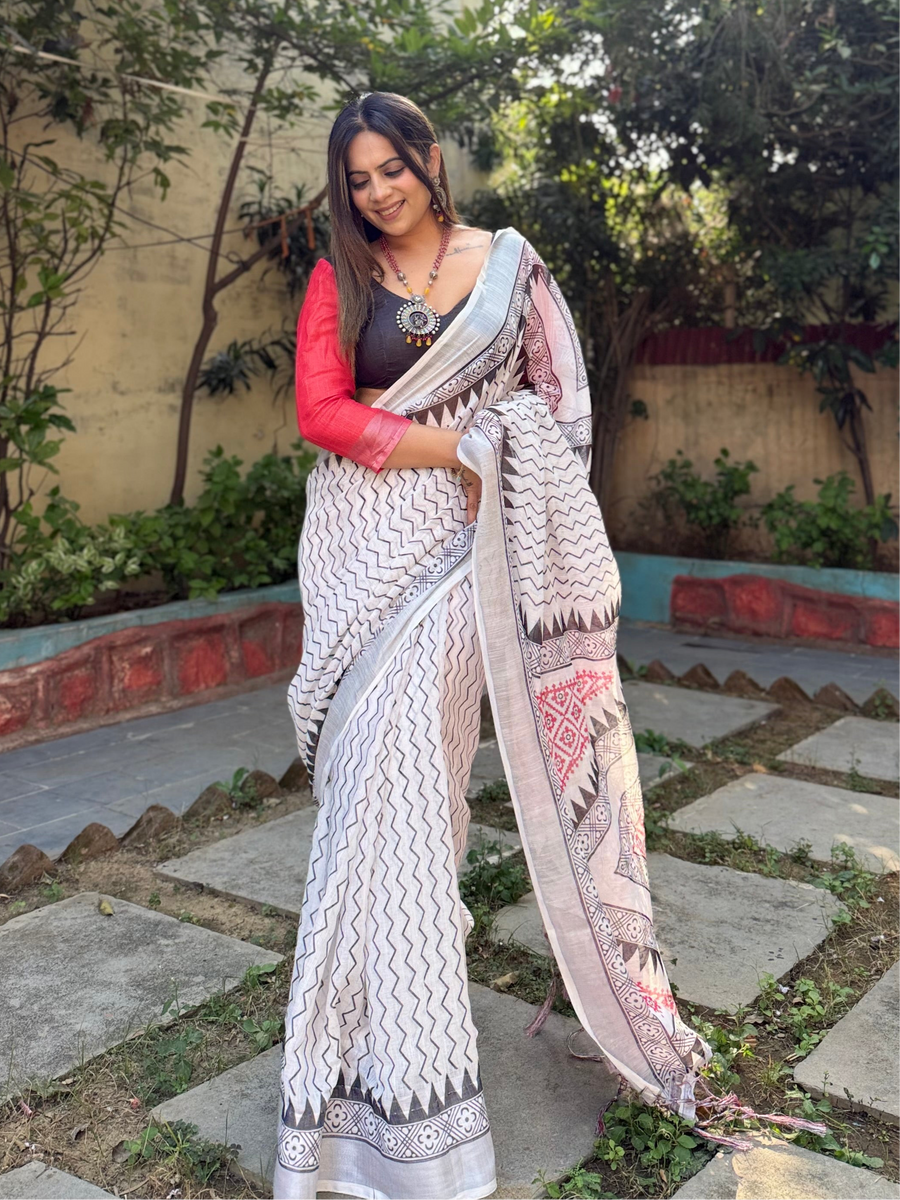 White Pure Linen Digital Printed Saree with Chevron Design and Intricate Red-Black Geometric Pallu – Tassel Details and Matching Blouse Piece