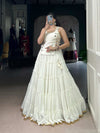 Close-up of White LNB Lehenga Embroidered with Embossed Design and Lace Border - Shree Roop