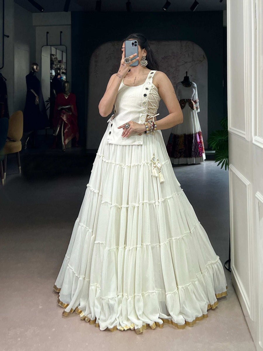 Close-up of White LNB Lehenga Embroidered with Embossed Design and Lace Border - Shree Roop