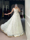 White LNB Lehenga with Zari Line Blouse and Real Mirror Koti Back View - Shree Roop