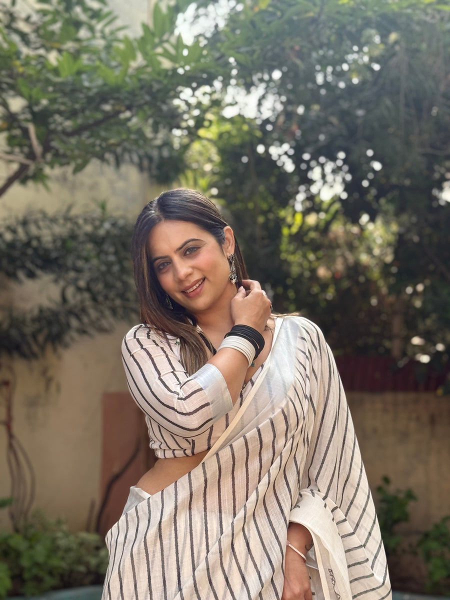 Off-White Pure Linen Digital Printed Saree with Striped Design and Unique Black Motif Pallu – Comes with Blouse Piece and Tassels