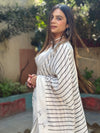 Off-White Pure Linen Digital Printed Saree with Striped Design and Unique Black Motif Pallu – Comes with Blouse Piece and Tassels