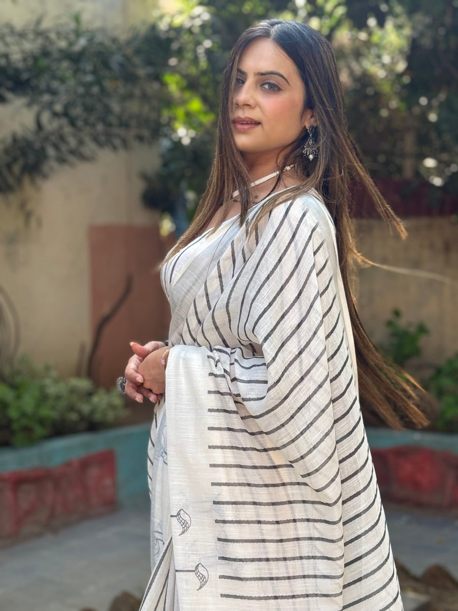 Off-White Pure Linen Digital Printed Saree with Striped Design and Unique Black Motif Pallu – Comes with Blouse Piece and Tassels