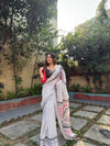 White Pure Linen Digital Printed Saree with Chevron Design and Intricate Red-Black Geometric Pallu – Tassel Details and Matching Blouse Piece