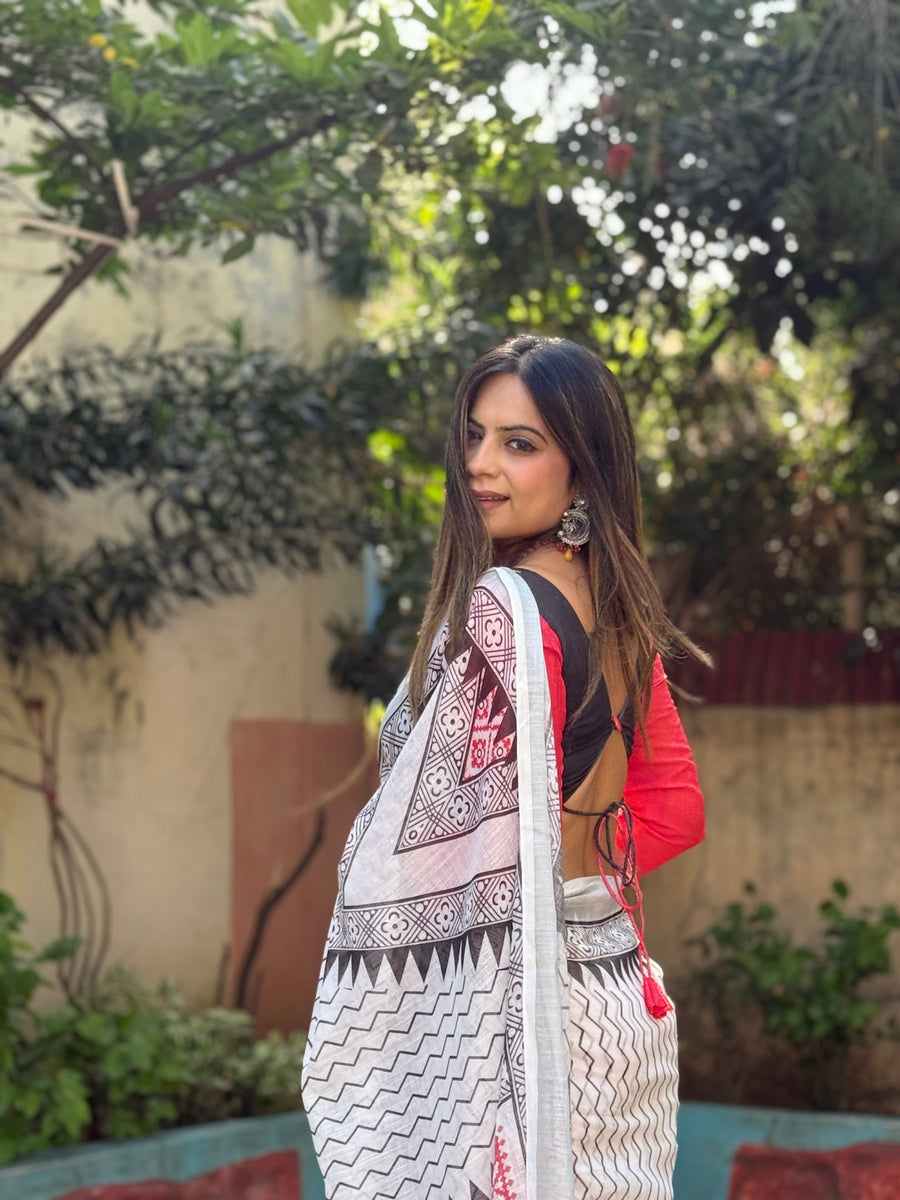 White Pure Linen Digital Printed Saree with Chevron Design and Intricate Red-Black Geometric Pallu – Tassel Details and Matching Blouse Piece