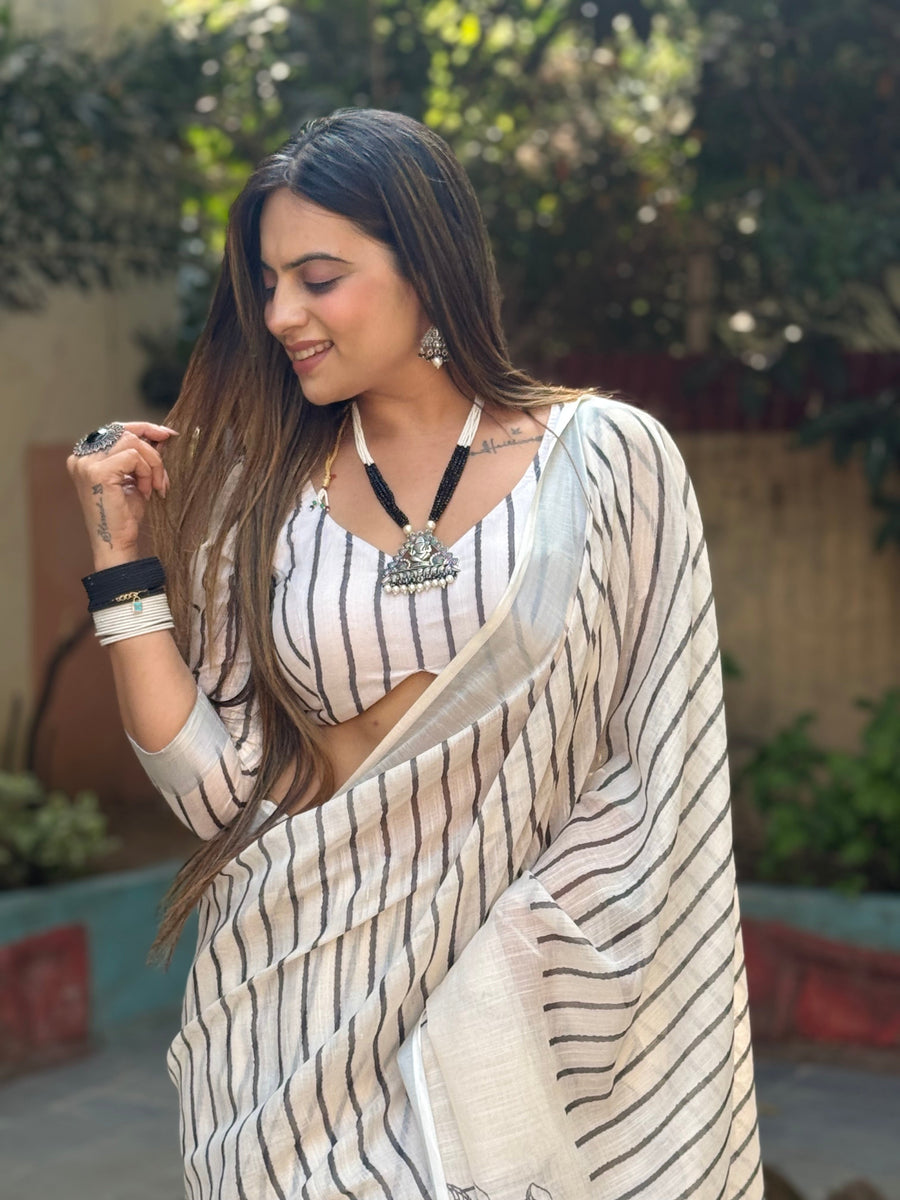Off-White Pure Linen Digital Printed Saree with Striped Design and Unique Black Motif Pallu – Comes with Blouse Piece and Tassels