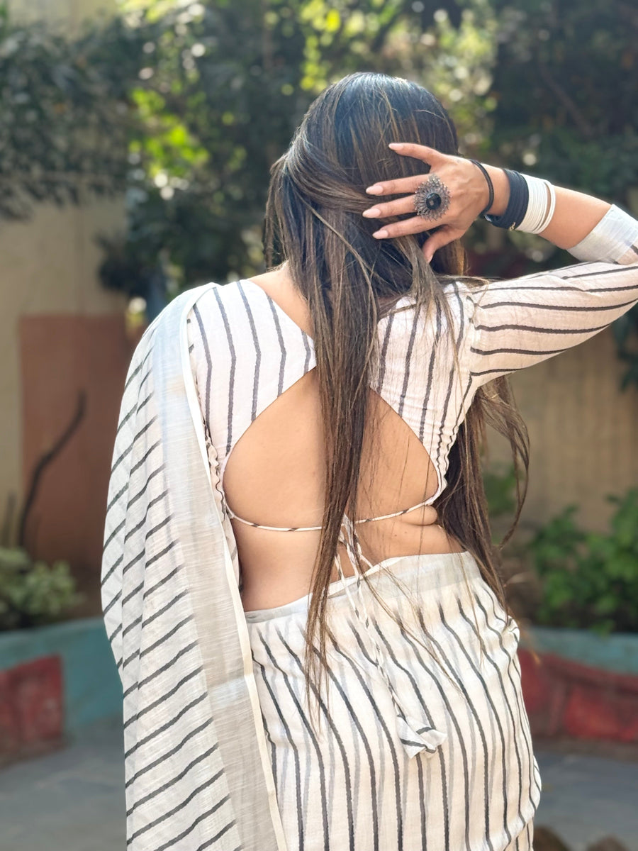 Off-White Pure Linen Digital Printed Saree with Striped Design and Unique Black Motif Pallu – Comes with Blouse Piece and Tassels