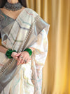 Beige Pure Linen Saree with Multicolor Zigzag Design and Tassel Finish