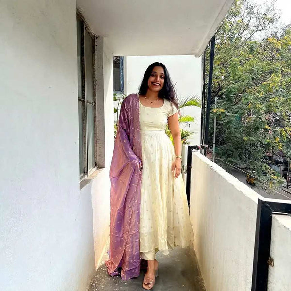 Full length cream Anarkali dress with lavender Space Silk dupatta - Shree Roop