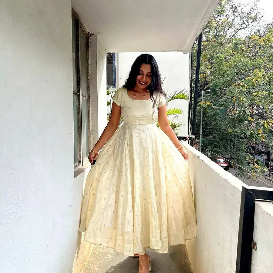 Close-up of Cream Anarkali Dress with Intricate Subtle Embroidery Work - Shree Roop