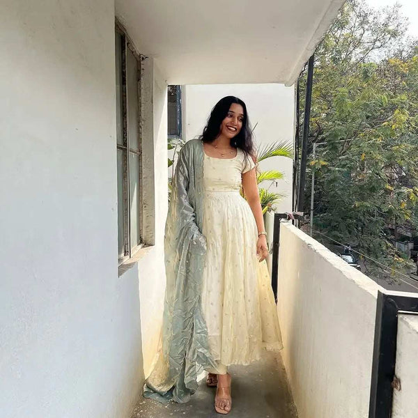 Cream Anarkali Dress with Light Grey Dupatta and Flared Silhouette for Festive Occasions - Shree Roop
