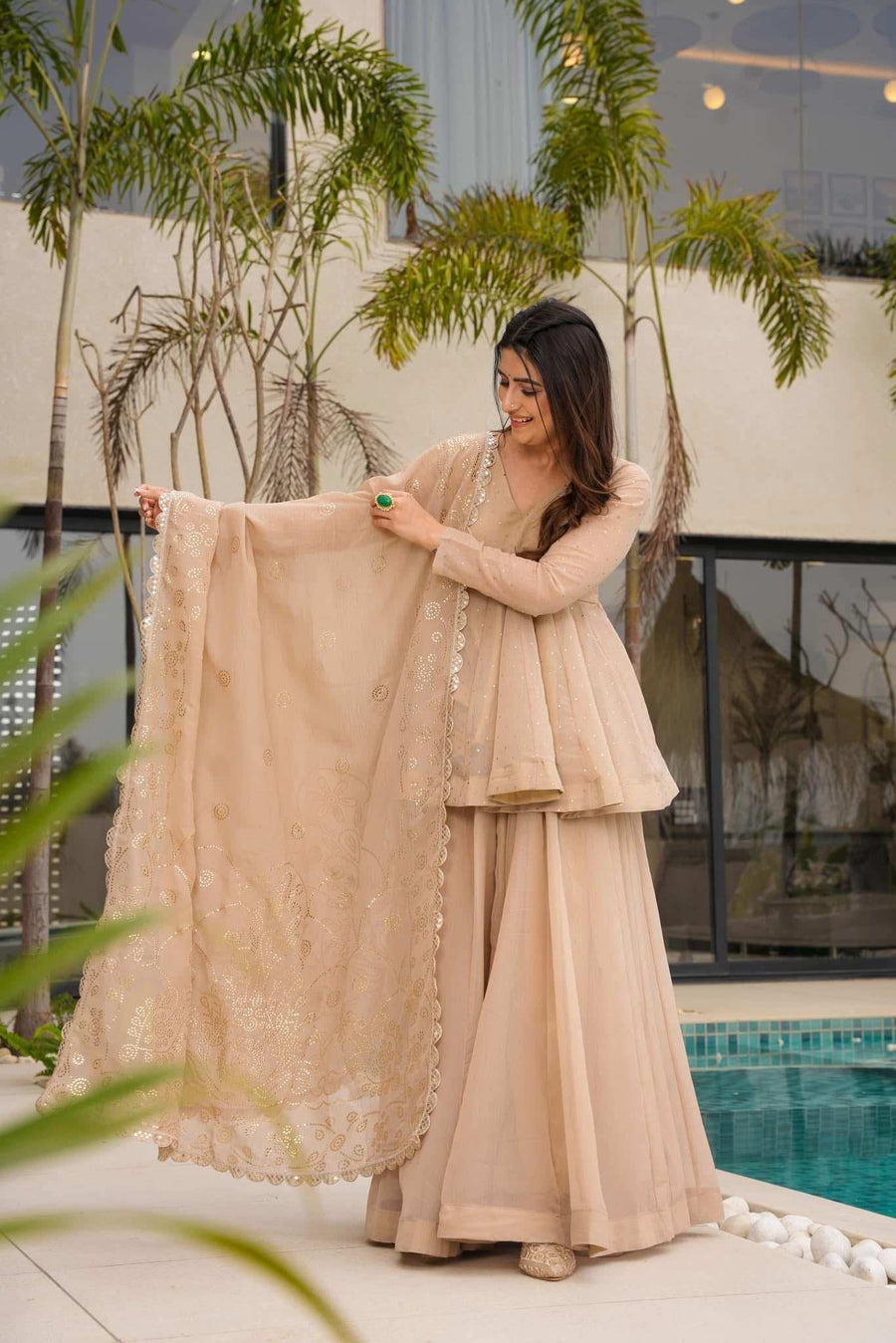 Full length view of beige tissue and organza sharara set with peplum kurti and sharara pants - Shree Roop