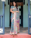 Aqua Blue Handloom Cotton Saree with Multicolor Floral Print & Royal Simha-Pakshi Pallu