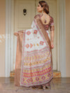 Ivory & Copper Brown Tribal Printed Saree with Rich Zari Border & Tassels – Ethnic Festive Wear