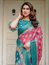 Rani Pink & Teal Green Floral Printed Saree with Rich Zari Border & Tassels – Festive Traditional Wear