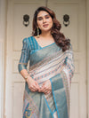 Off-White & Aqua Teal Traditional Printed Saree with Rich Zari Border & Tassels – Ethnic Festive Wear