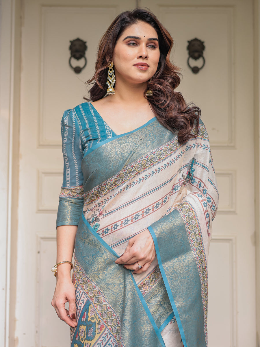 Off-White & Aqua Teal Traditional Printed Saree with Rich Zari Border & Tassels – Ethnic Festive Wear