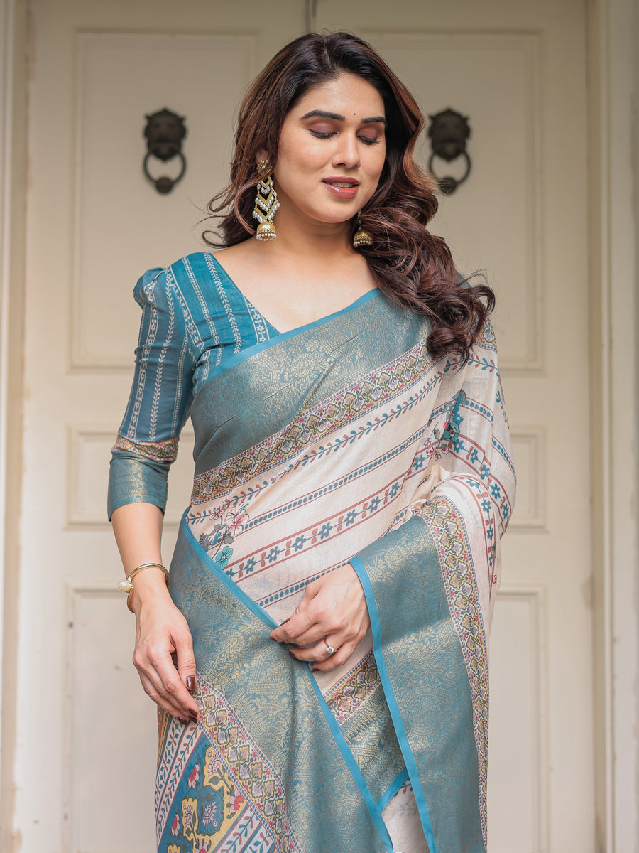 Off-White & Aqua Teal Traditional Printed Saree with Rich Zari Border & Tassels – Ethnic Festive Wear