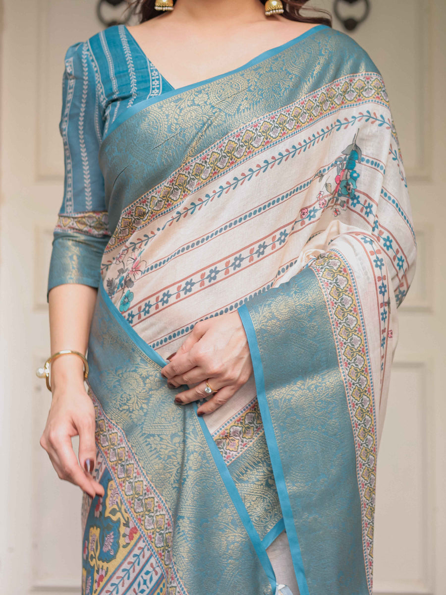 Off-White & Aqua Teal Traditional Printed Saree with Rich Zari Border & Tassels – Ethnic Festive Wear