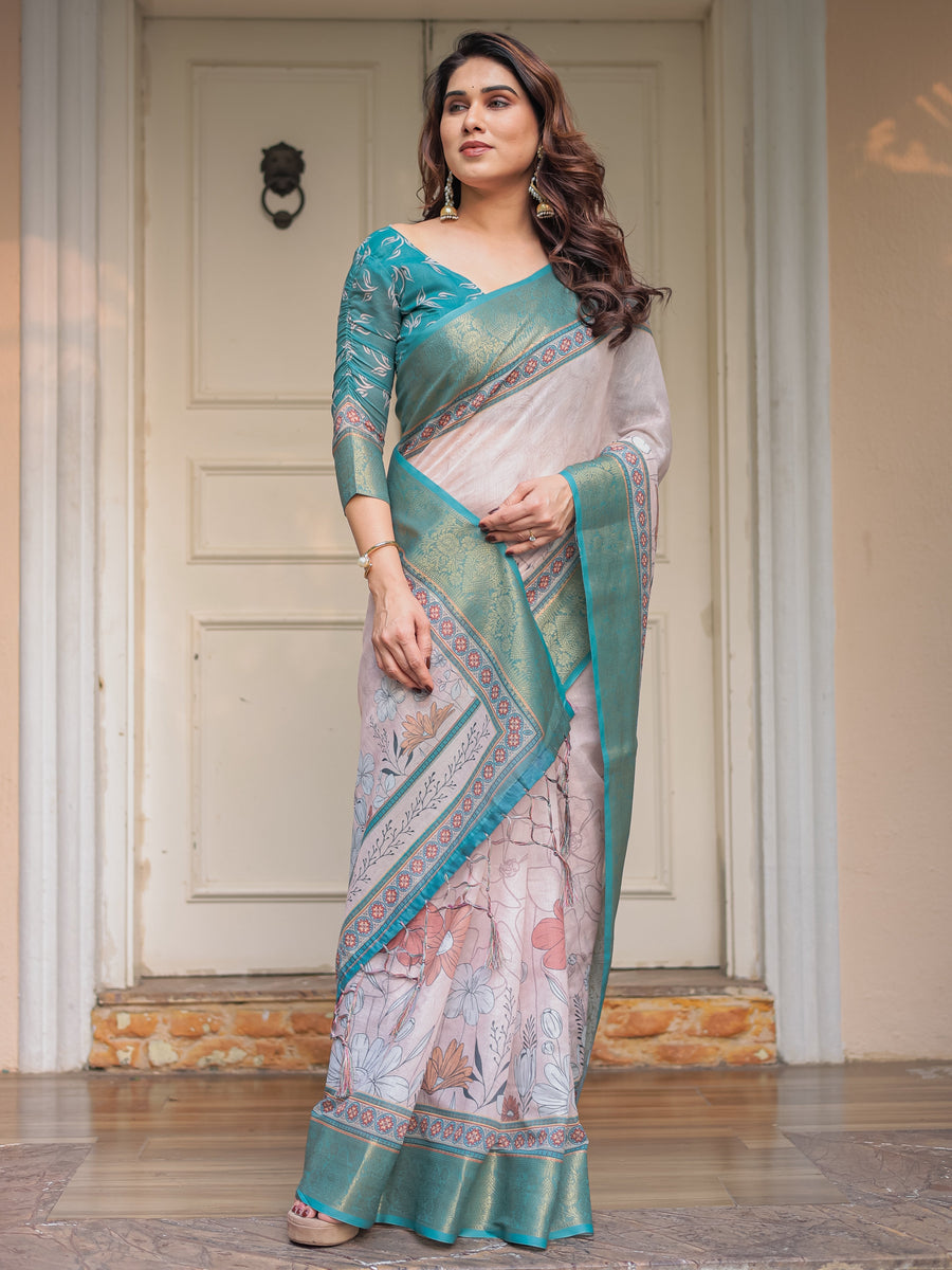 Pastel Lavender Floral Printed Saree with Teal Green Zari Border & Tassels – Festive Ethnic Wear