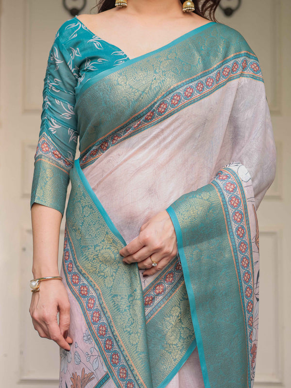 Pastel Lavender Floral Printed Saree with Teal Green Zari Border & Tassels – Festive Ethnic Wear