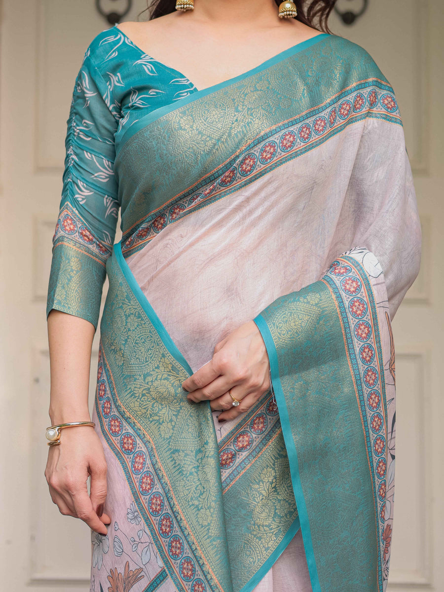 Pastel Lavender Floral Printed Saree with Teal Green Zari Border & Tassels – Festive Ethnic Wear