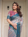 Ivory Floral Printed Saree with Rose Pink & Teal Blue Zari Border & Tassels – Festive Ethnic Wear