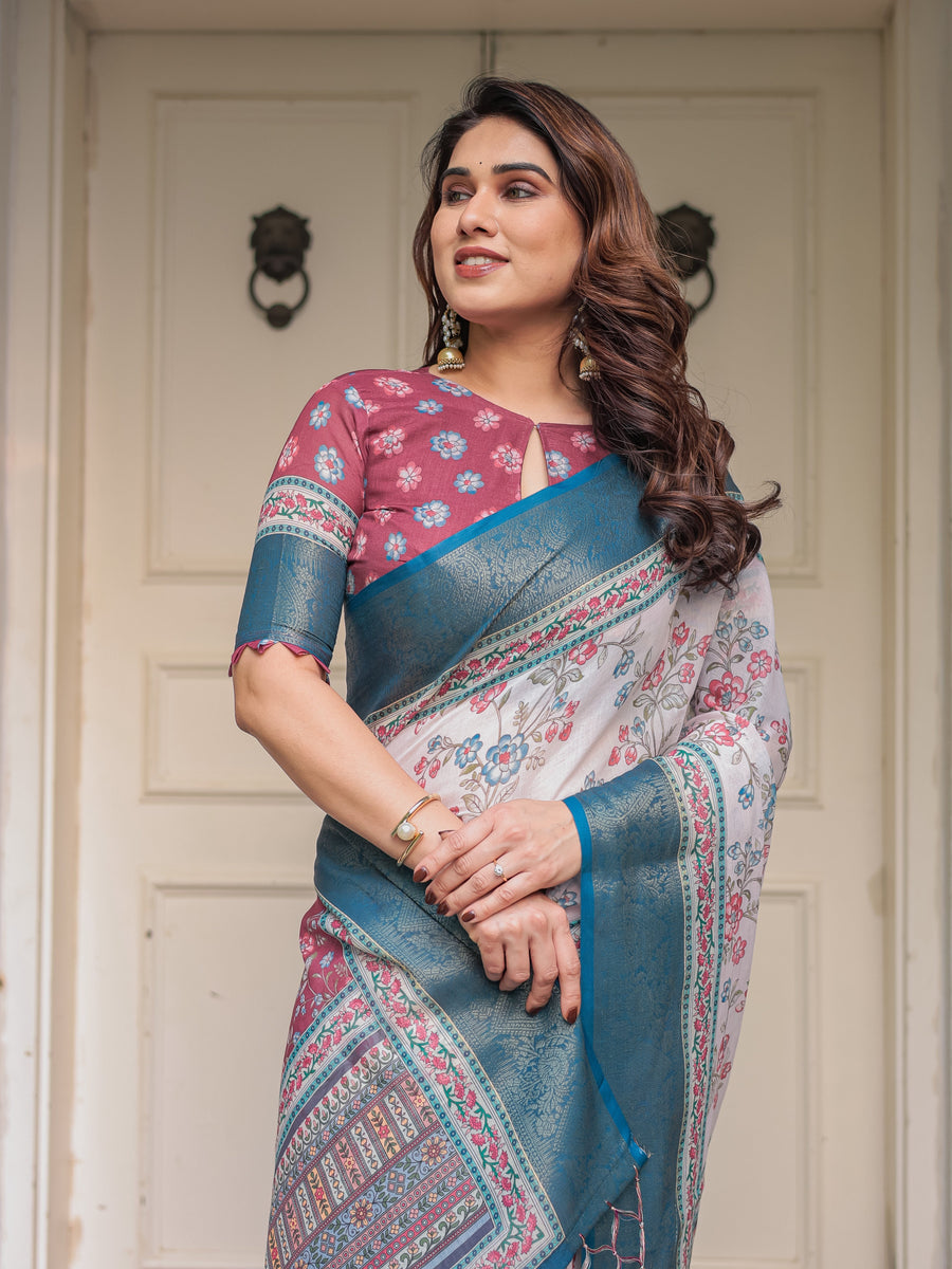 Ivory Floral Printed Saree with Rose Pink & Teal Blue Zari Border & Tassels – Festive Ethnic Wear
