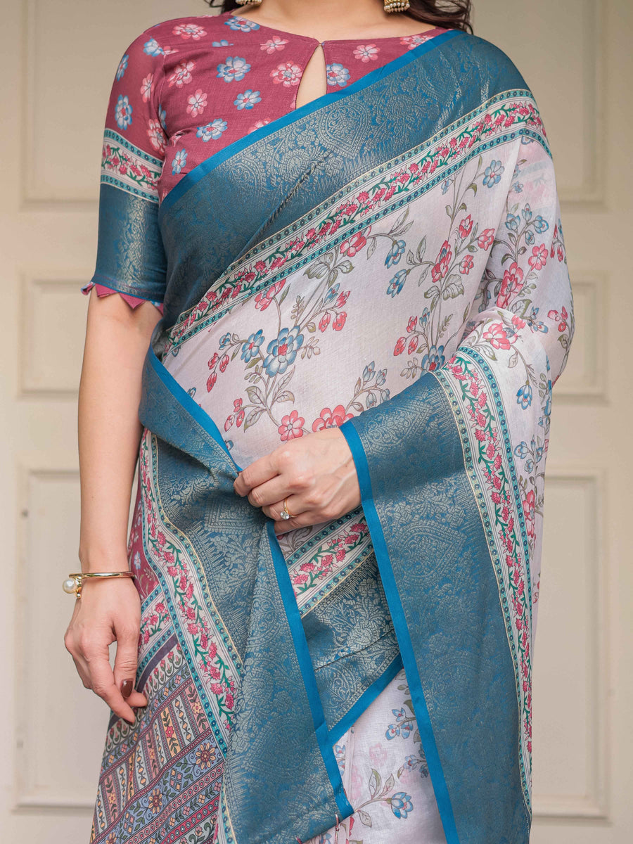 Ivory Floral Printed Saree with Rose Pink & Teal Blue Zari Border & Tassels – Festive Ethnic Wear
