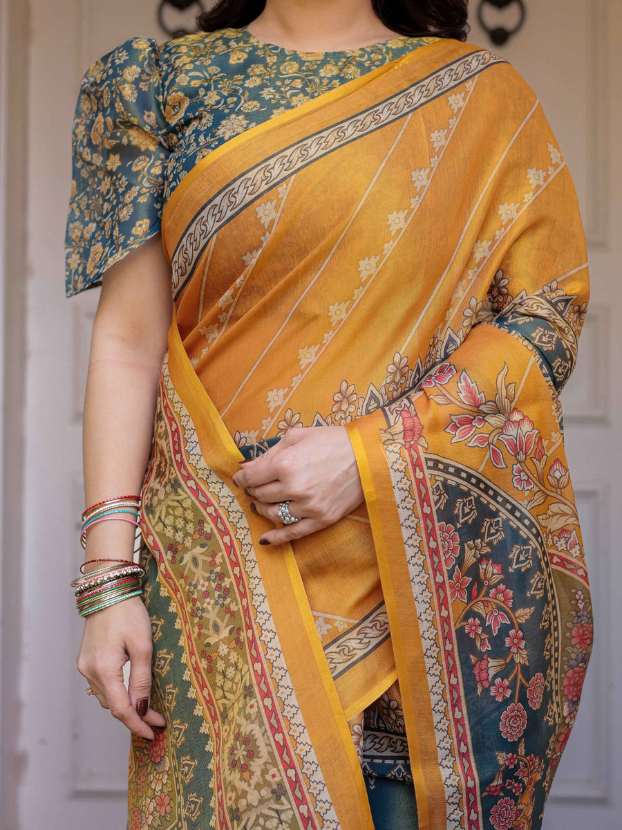 Mustard Yellow & Teal Green Floral Panel Printed Handloom Cotton Saree with Heritage Border & Tassels – Festive Traditional Wear