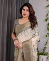 Cream & Gold Woven Ikat Silk Saree with Designer Border With Tassles