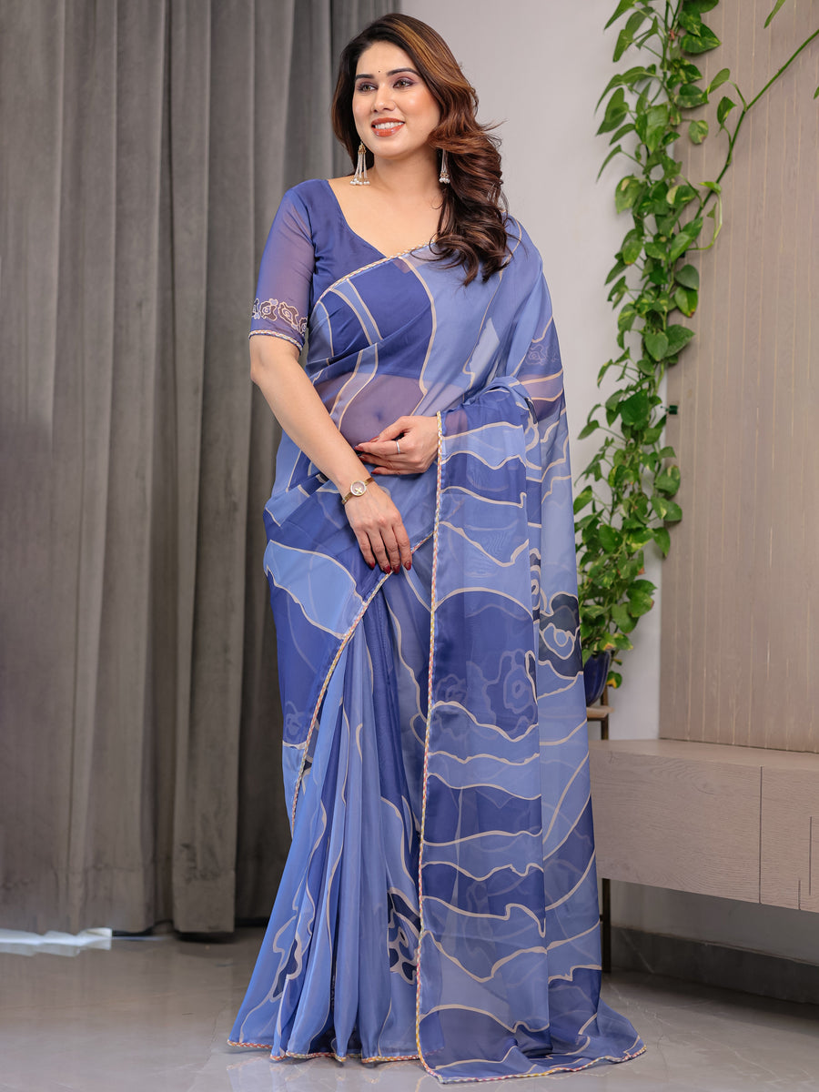 Steel Blue Printed Organza Saree with Abstract Wave Motifs & Multicolour Lace Border | Designer Lightweight Organza Saree with Attached Blouse Piece | Contemporary Festive Wear Saree