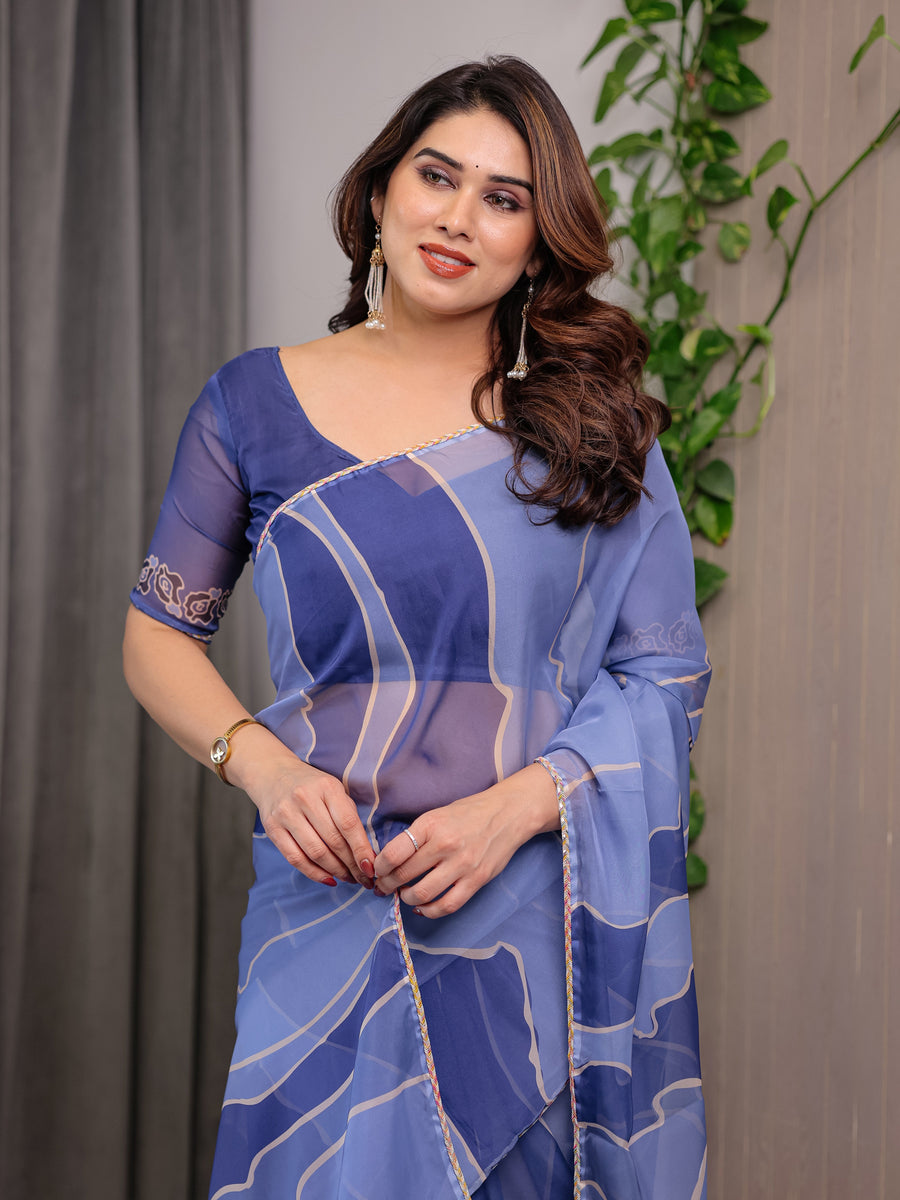 Steel Blue Printed Organza Saree with Abstract Wave Motifs & Multicolour Lace Border | Designer Lightweight Organza Saree with Attached Blouse Piece | Contemporary Festive Wear Saree