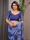 Steel Blue Printed Organza Saree with Abstract Wave Motifs & Multicolour Lace Border | Designer Lightweight Organza Saree with Attached Blouse Piece | Contemporary Festive Wear Saree