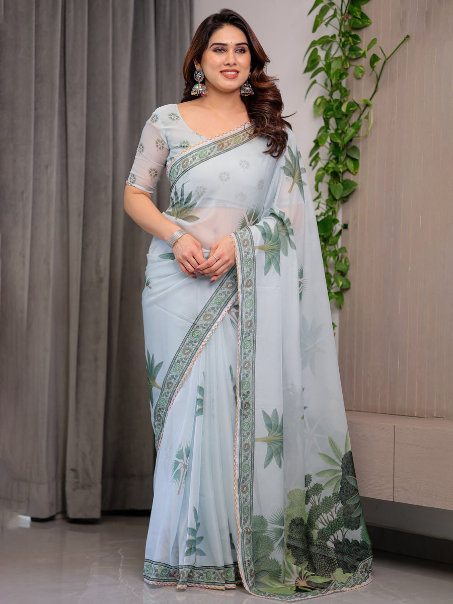 Pastel Mint Green Printed Organza Saree with Tropical Leaf Motifs | Designer Lightweight Sheer Organza Saree with Attached Blouse Piece | Festive & Day Party Saree
