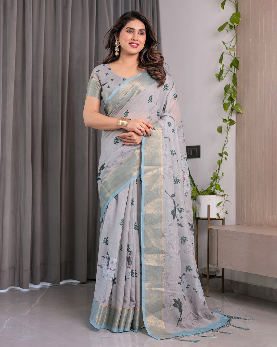 Ice Grey Handloom Linen Saree with Floral Print, Gold Zari Border & Tassel Detailing | Attached Blouse Piece | 5.5m Saree + 0.8m Blouse